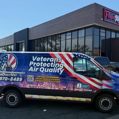 AirDuctVet residential and commercial cleaning quote: a branded AirDuctVet van at a commercial property