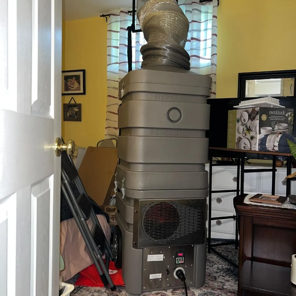HyperVac Hybrid vacuum system set up indoors for professional duct cleaning.