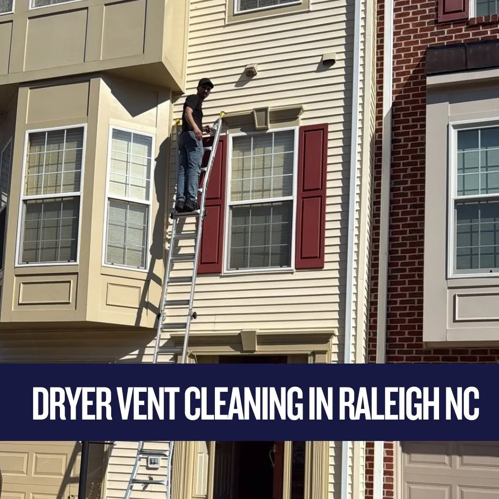 Technician standing high on an aluminum extension ladder to service a second-story exterior exhaust flap, providing professional dryer vent cleaning in Raleigh NC.