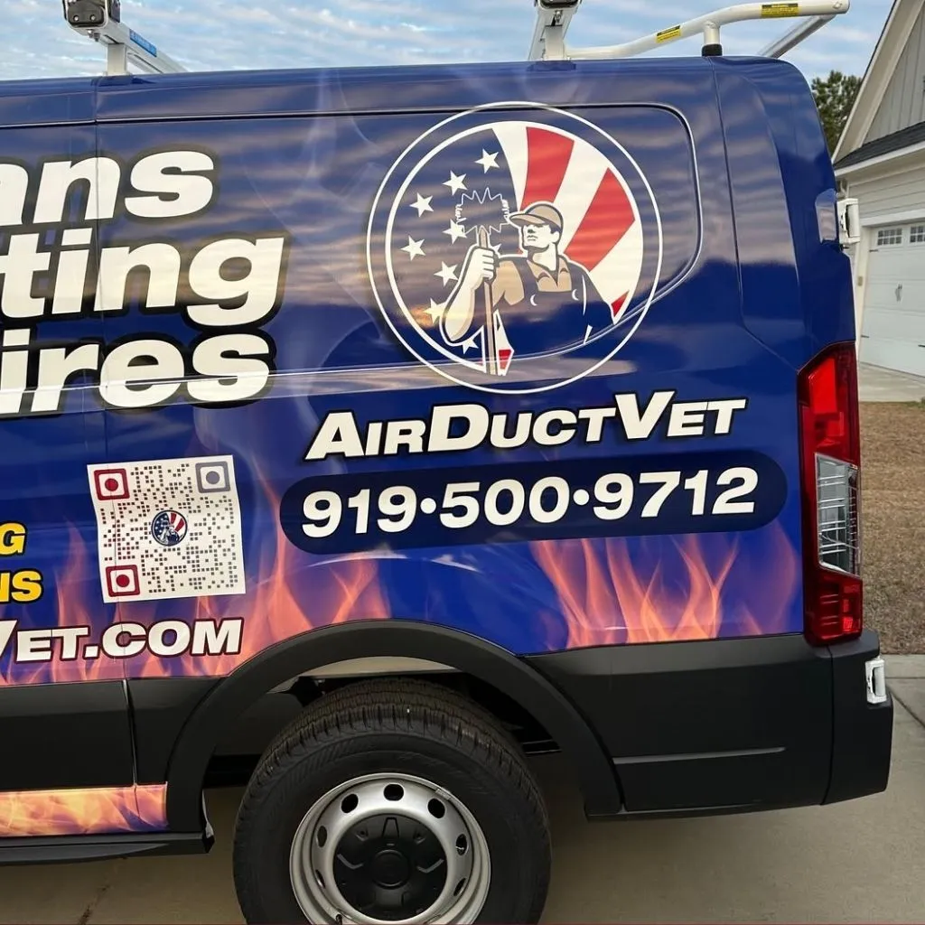 Close-up of the AirDuctVet service van displaying the company logo and phone number, fully equipped to transport the AirCare Hepa 3000CFM to residential appointments.